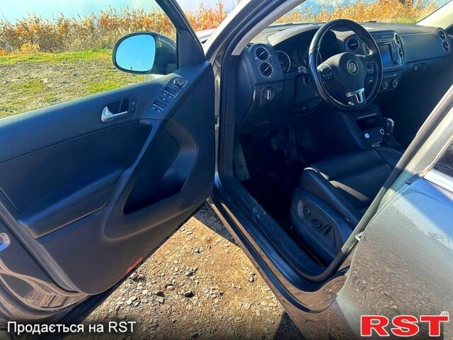 Серый Фольксваген Тигуан, объемом двигателя 2 л и пробегом 195 тыс. км за 13000 $, фото 10 на Automoto.ua