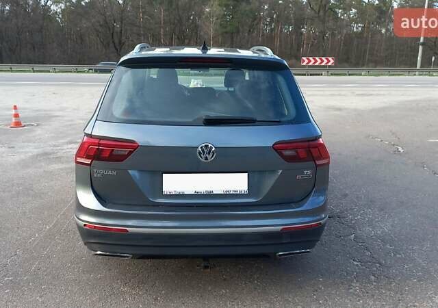 Серый Фольксваген Тигуан, объемом двигателя 2 л и пробегом 147 тыс. км за 23000 $, фото 3 на Automoto.ua