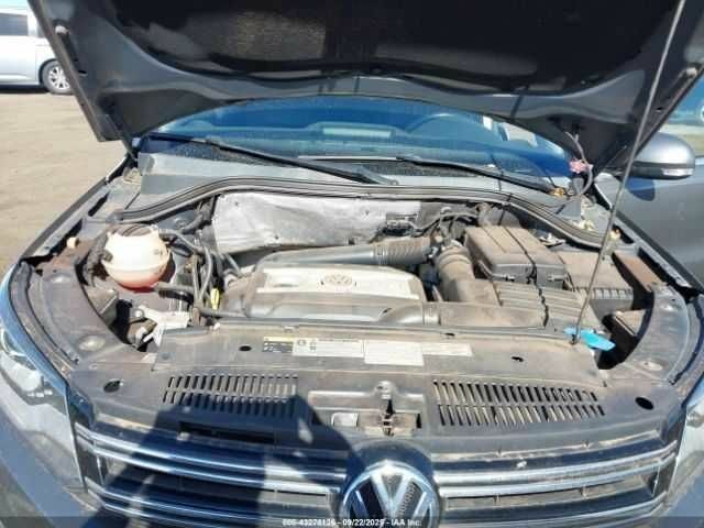 Серый Фольксваген Тигуан, объемом двигателя 2 л и пробегом 55 тыс. км за 8000 $, фото 9 на Automoto.ua