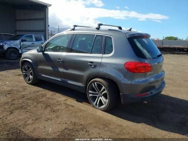 Серый Фольксваген Тигуан, объемом двигателя 2 л и пробегом 55 тыс. км за 8000 $, фото 2 на Automoto.ua