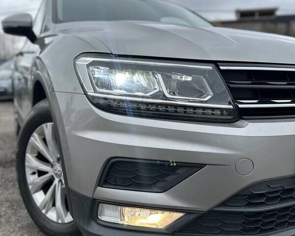 Серый Фольксваген Тигуан, объемом двигателя 1.97 л и пробегом 165 тыс. км за 25999 $, фото 2 на Automoto.ua