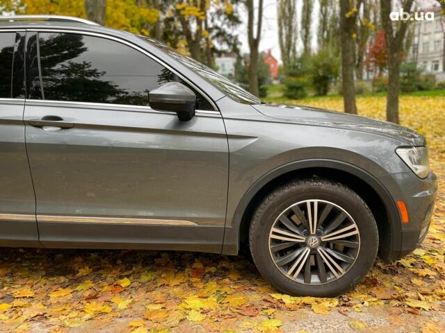 Серый Фольксваген Тигуан, объемом двигателя 2 л и пробегом 205 тыс. км за 16940 $, фото 8 на Automoto.ua