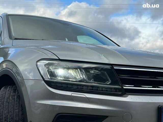 Серый Фольксваген Тигуан, объемом двигателя 2 л и пробегом 250 тыс. км за 22680 $, фото 12 на Automoto.ua