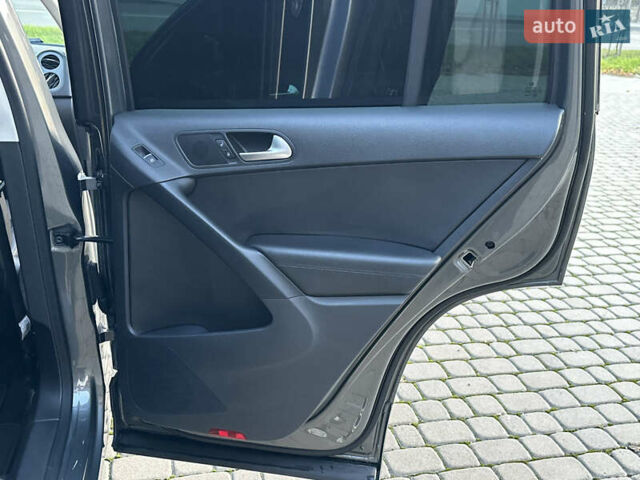 Сірий Фольксваген Тігуан, об'ємом двигуна 1.98 л та пробігом 158 тис. км за 13999 $, фото 34 на Automoto.ua