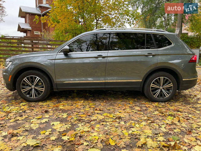 Серый Фольксваген Тигуан, объемом двигателя 2 л и пробегом 205 тыс. км за 16940 $, фото 18 на Automoto.ua