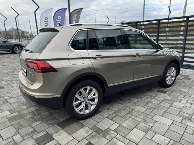 Серый Фольксваген Тигуан, объемом двигателя 2 л и пробегом 320 тыс. км за 20500 $, фото 2 на Automoto.ua