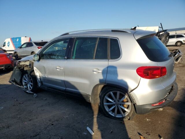 Сірий Фольксваген Тігуан, об'ємом двигуна 2 л та пробігом 166 тис. км за 8300 $, фото 3 на Automoto.ua