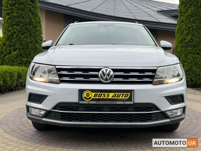 Сірий Фольксваген Тігуан, об'ємом двигуна 2 л та пробігом 60 тис. км за 24699 $, фото 1 на Automoto.ua