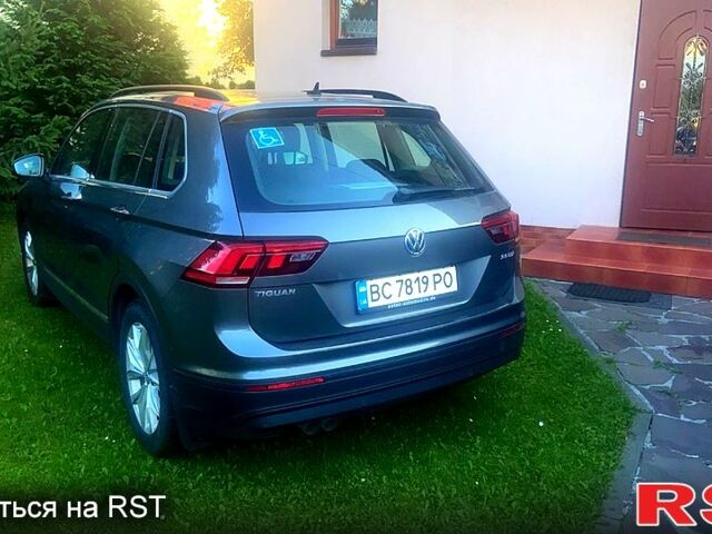 Серый Фольксваген Тигуан, объемом двигателя 2 л и пробегом 118 тыс. км за 23600 $, фото 5 на Automoto.ua