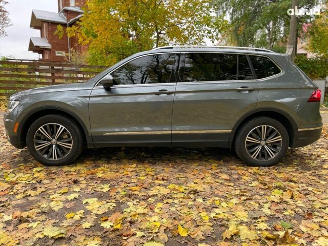 Серый Фольксваген Тигуан, объемом двигателя 2 л и пробегом 205 тыс. км за 16940 $, фото 17 на Automoto.ua