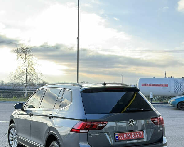 Серый Фольксваген Тигуан, объемом двигателя 2 л и пробегом 240 тыс. км за 14999 $, фото 5 на Automoto.ua
