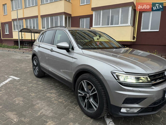 Серый Фольксваген Тигуан, объемом двигателя 1.97 л и пробегом 149 тыс. км за 25000 $, фото 2 на Automoto.ua