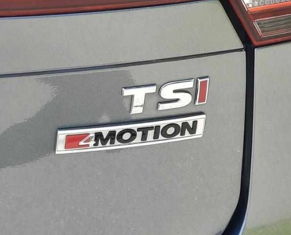 Сірий Фольксваген Тігуан, об'ємом двигуна 2 л та пробігом 105 тис. км за 11000 $, фото 4 на Automoto.ua