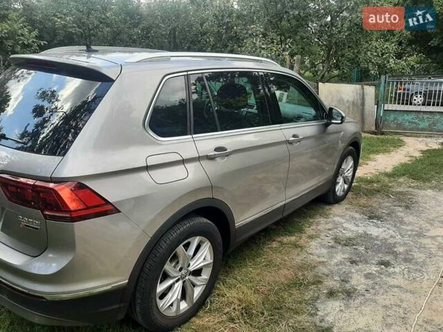 Серый Фольксваген Тигуан, объемом двигателя 1.98 л и пробегом 241 тыс. км за 24000 $, фото 4 на Automoto.ua
