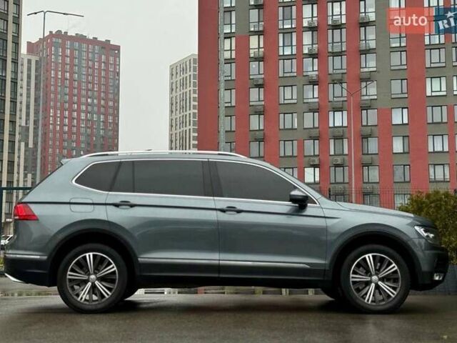 Серый Фольксваген Тигуан, объемом двигателя 2 л и пробегом 155 тыс. км за 18500 $, фото 10 на Automoto.ua