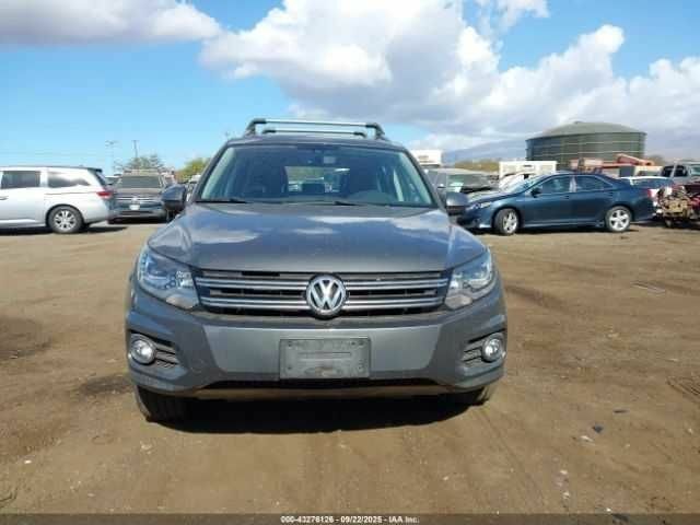 Серый Фольксваген Тигуан, объемом двигателя 2 л и пробегом 55 тыс. км за 8000 $, фото 11 на Automoto.ua