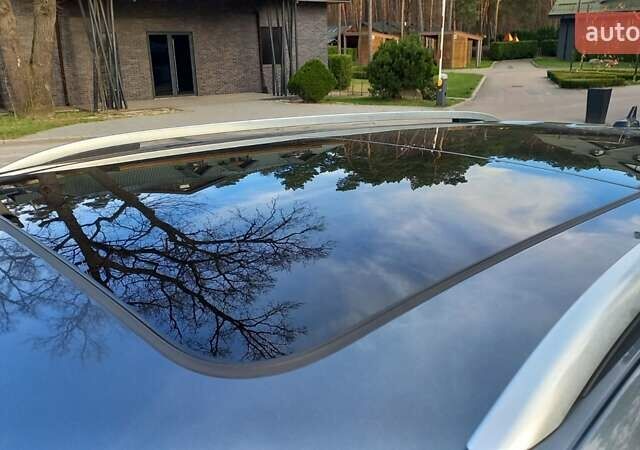 Серый Фольксваген Тигуан, объемом двигателя 2 л и пробегом 147 тыс. км за 23000 $, фото 2 на Automoto.ua