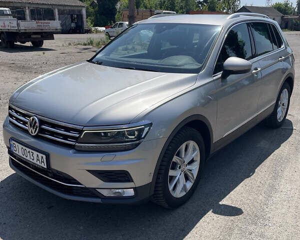 Серый Фольксваген Тигуан, объемом двигателя 1.97 л и пробегом 84 тыс. км за 29000 $, фото 3 на Automoto.ua