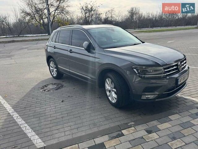 Серый Фольксваген Тигуан, объемом двигателя 2 л и пробегом 197 тыс. км за 22900 $, фото 1 на Automoto.ua