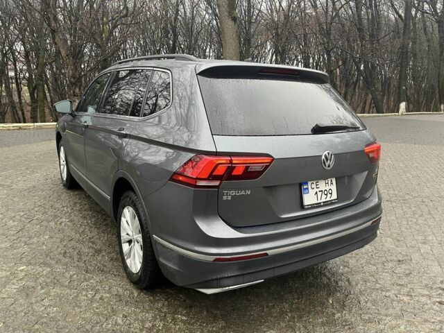 Сірий Фольксваген Тігуан, об'ємом двигуна 2 л та пробігом 126 тис. км за 19400 $, фото 5 на Automoto.ua