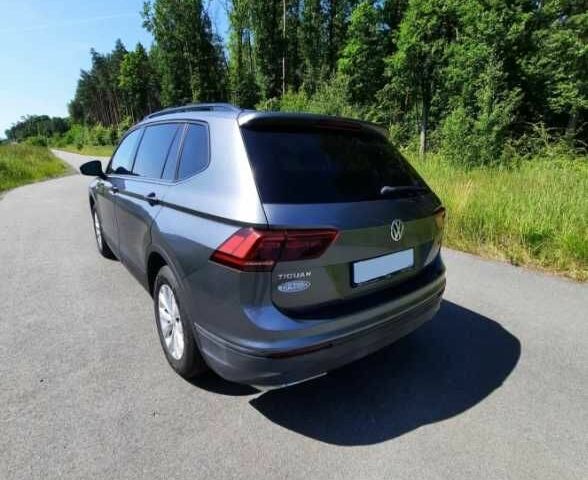 Сірий Фольксваген Тігуан, об'ємом двигуна 2 л та пробігом 105 тис. км за 11000 $, фото 5 на Automoto.ua