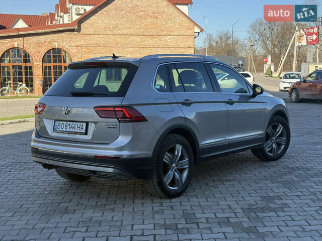 Серый Фольксваген Тигуан, объемом двигателя 2 л и пробегом 224 тыс. км за 25700 $, фото 7 на Automoto.ua