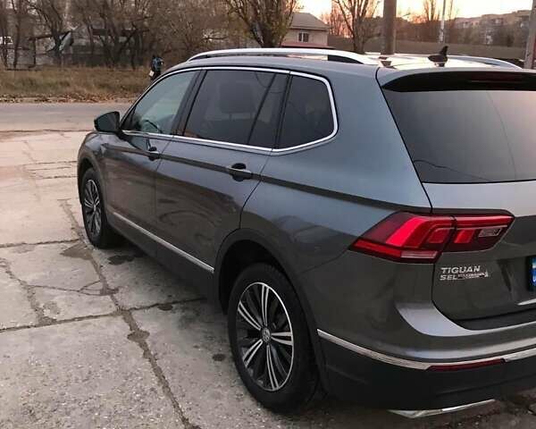 Серый Фольксваген Тигуан, объемом двигателя 2 л и пробегом 75 тыс. км за 20000 $, фото 10 на Automoto.ua