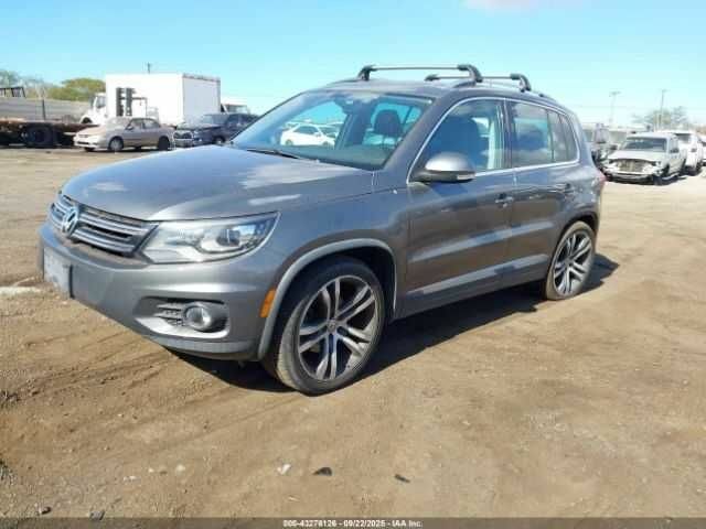 Серый Фольксваген Тигуан, объемом двигателя 2 л и пробегом 55 тыс. км за 8000 $, фото 1 на Automoto.ua