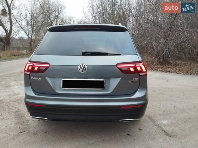 Сірий Фольксваген Тігуан, об'ємом двигуна 1.98 л та пробігом 160 тис. км за 16000 $, фото 5 на Automoto.ua