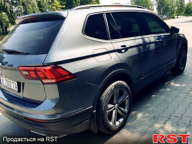 Серый Фольксваген Тигуан, объемом двигателя 2 л и пробегом 88 тыс. км за 16500 $, фото 2 на Automoto.ua