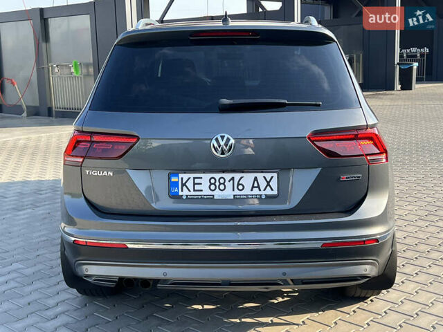 Серый Фольксваген Тигуан, объемом двигателя 1.97 л и пробегом 169 тыс. км за 25300 $, фото 3 на Automoto.ua