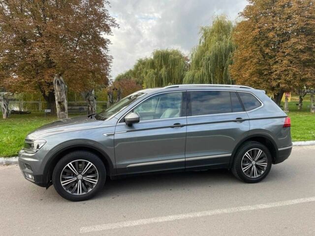 Серый Фольксваген Тигуан, объемом двигателя 2 л и пробегом 135 тыс. км за 18500 $, фото 1 на Automoto.ua