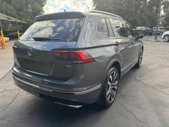 Сірий Фольксваген Тігуан, об'ємом двигуна 2 л та пробігом 38 тис. км за 9000 $, фото 6 на Automoto.ua