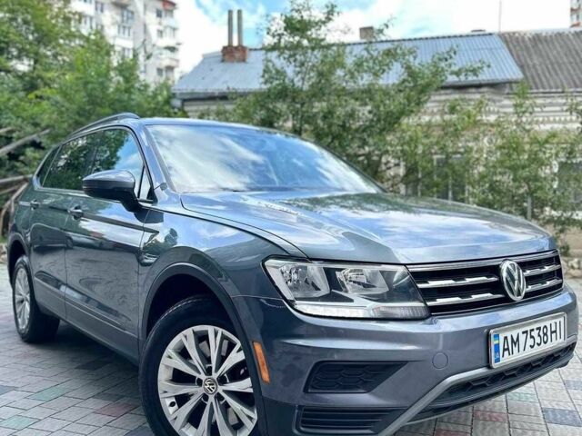 Серый Фольксваген Тигуан, объемом двигателя 2 л и пробегом 103 тыс. км за 331 $, фото 1 на Automoto.ua