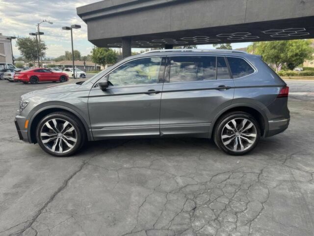 Сірий Фольксваген Тігуан, об'ємом двигуна 2 л та пробігом 38 тис. км за 9000 $, фото 3 на Automoto.ua