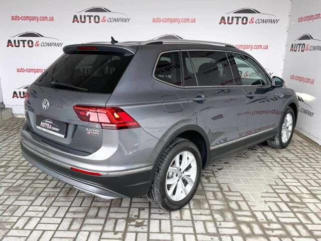Серый Фольксваген Тигуан, объемом двигателя 2 л и пробегом 155 тыс. км за 28450 $, фото 2 на Automoto.ua