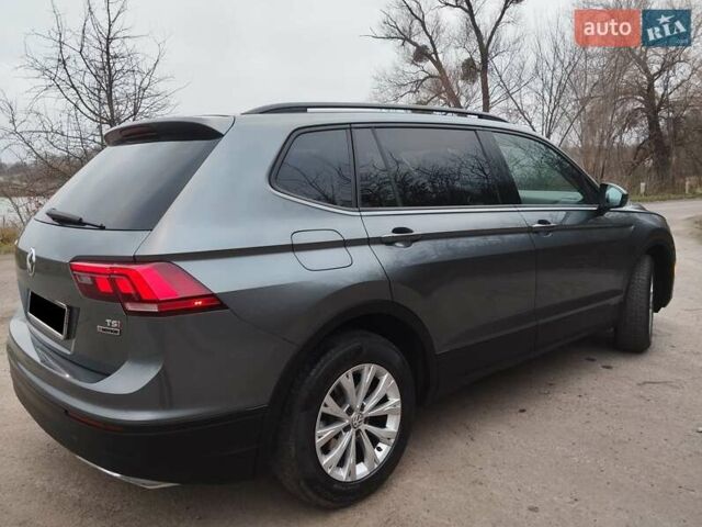Сірий Фольксваген Тігуан, об'ємом двигуна 1.98 л та пробігом 160 тис. км за 16000 $, фото 4 на Automoto.ua
