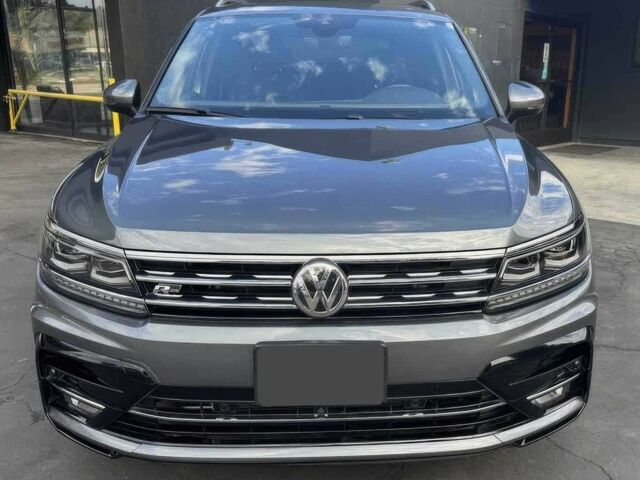 Сірий Фольксваген Тігуан, об'ємом двигуна 2 л та пробігом 38 тис. км за 9000 $, фото 1 на Automoto.ua