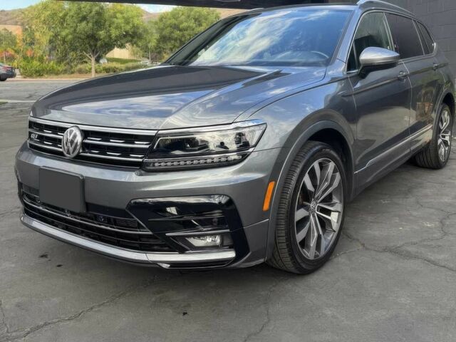 Сірий Фольксваген Тігуан, об'ємом двигуна 2 л та пробігом 38 тис. км за 9000 $, фото 2 на Automoto.ua