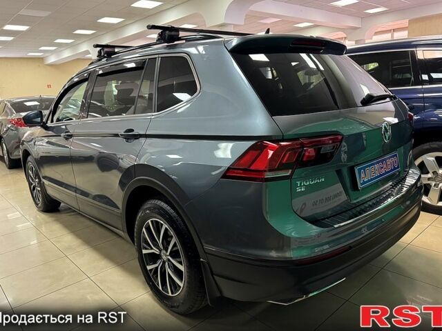 Серый Фольксваген Тигуан, объемом двигателя 2 л и пробегом 189 тыс. км за 19900 $, фото 3 на Automoto.ua