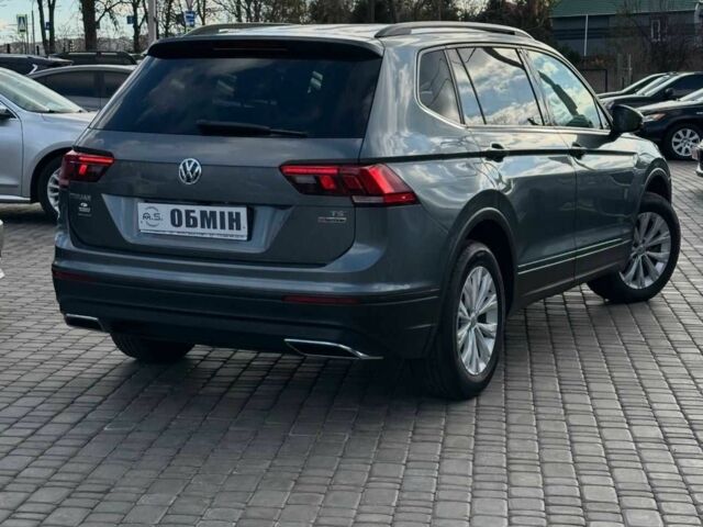 Серый Фольксваген Тигуан, объемом двигателя 2 л и пробегом 129 тыс. км за 17450 $, фото 1 на Automoto.ua