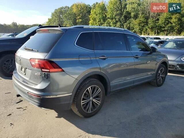 Серый Фольксваген Тигуан, объемом двигателя 1.98 л и пробегом 165 тыс. км за 4300 $, фото 2 на Automoto.ua