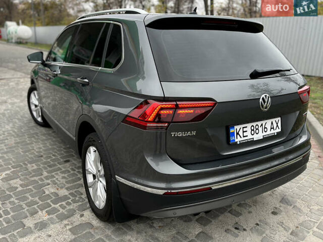 Серый Фольксваген Тигуан, объемом двигателя 1.97 л и пробегом 169 тыс. км за 24800 $, фото 4 на Automoto.ua