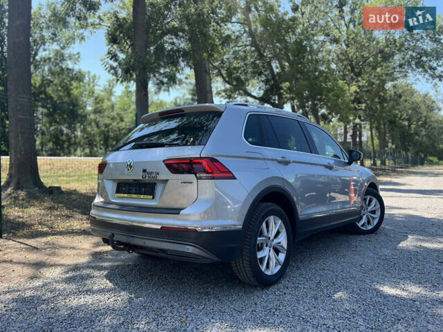 Сірий Фольксваген Тігуан, об'ємом двигуна 1.97 л та пробігом 258 тис. км за 23950 $, фото 2 на Automoto.ua