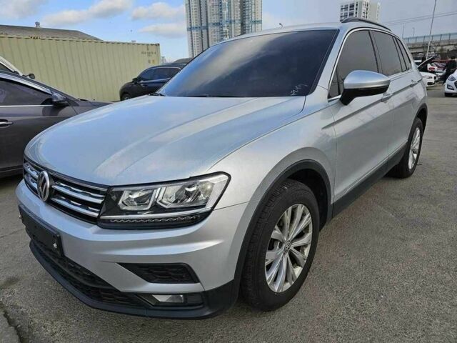 Серый Фольксваген Тигуан, объемом двигателя 2 л и пробегом 67 тыс. км за 20000 $, фото 2 на Automoto.ua
