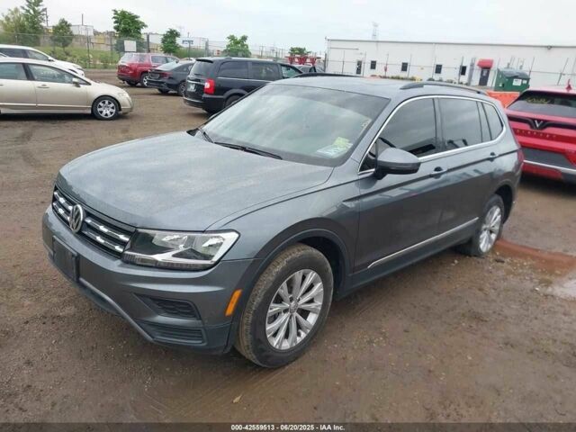 Серый Фольксваген Тигуан, объемом двигателя 2 л и пробегом 58 тыс. км за 18500 $, фото 1 на Automoto.ua