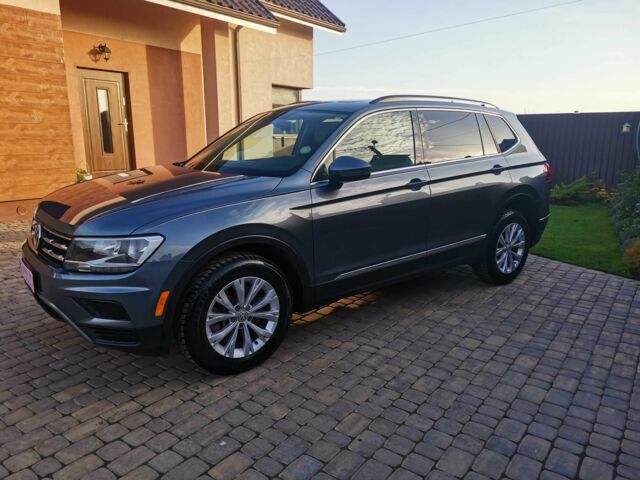 Серый Фольксваген Тигуан, объемом двигателя 2 л и пробегом 165 тыс. км за 16700 $, фото 9 на Automoto.ua