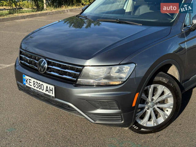 Сірий Фольксваген Тігуан, об'ємом двигуна 1.98 л та пробігом 155 тис. км за 18500 $, фото 4 на Automoto.ua