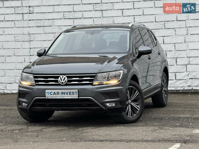 Серый Фольксваген Тигуан, объемом двигателя 2 л и пробегом 187 тыс. км за 18500 $, фото 4 на Automoto.ua