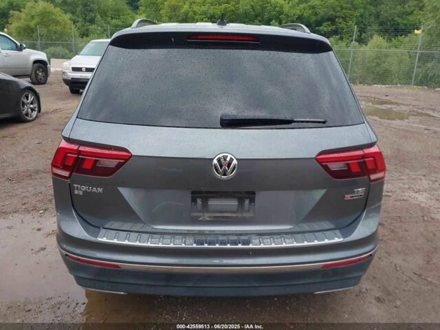 Серый Фольксваген Тигуан, объемом двигателя 2 л и пробегом 58 тыс. км за 18500 $, фото 3 на Automoto.ua